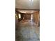Interior view of a living room featuring bare studs, ceiling fan and the need for remodeling at 1099 Warren Dr, Riverdale, GA 30296