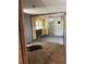 A partially renovated room, revealing the framework with yellow accent walls at 1099 Warren Dr, Riverdale, GA 30296