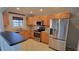 Modern kitchen with stainless steel appliances, granite countertops, and tile floor at 2825 Northeast Expy # F 03, Atlanta, GA 30345