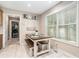 Kitchen nook with a table, benches, and plenty of window light at 1850 Brooks Pointe Ct, Lawrenceville, GA 30045