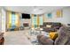 Relaxing living room with a fireplace, ample lighting, and comfortable sofas at 1850 Brooks Pointe Ct, Lawrenceville, GA 30045
