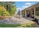 Landscaped backyard with a patio, perfect for outdoor entertaining and relaxation at 201 Aster Ct, Canton, GA 30114