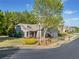 Street view of an attractive home with a well-maintained lawn, established trees, and charming curb appeal at 201 Aster Ct, Canton, GA 30114