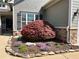 Charming home featuring a beautiful front yard with a red Japanese maple tree at 201 Aster Ct, Canton, GA 30114