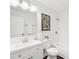 Modern bathroom featuring stylish fixtures, vanity, and a framed decorative wall art at 2201 Huntingdon Chase St, Atlanta, GA 30350