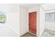 Unit 2201 featuring a red front door with gold hardware and address numbers at 2201 Huntingdon Chase St, Atlanta, GA 30350