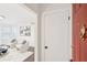 Bright living room with stylish decor, neutral tones, and dark hardwood floors at 2201 Huntingdon Chase St, Atlanta, GA 30350
