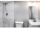 Bathroom featuring a stand up shower, mirror, and vanity at 2745 Saxon Drive, Duluth, GA 30096