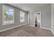 Bedroom with plush carpet, windows, and access to an en-suite bathroom at 1179 Bennett Creek Overlook, Suwanee, GA 30024