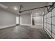 Spacious two car garage with automatic door opener, water heater, and plenty of storage space at 1179 Bennett Creek Overlook, Suwanee, GA 30024