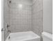 Bathroom shower featuring stylish tiled walls and modern fixtures at 1179 Bennett Creek Overlook, Suwanee, GA 30024