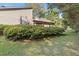 The well-manicured backyard features lush greenery and manicured lawns at 2520 Hartford Dr, Ellenwood, GA 30294
