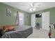 This neutral bedroom offers a modern ceiling fan, and good closet space at 2520 Hartford Dr, Ellenwood, GA 30294