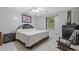 Bedroom featuring a Queen bed and wood floors at 2520 Hartford Dr, Ellenwood, GA 30294