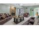 Comfortable living room with a stone fireplace and cozy leather seating at 2520 Hartford Dr, Ellenwood, GA 30294
