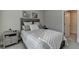 Neutrally decorated bedroom with a full sized bed, carpet, and natural light from a window at 3364 Old Concord Se Rd, Smyrna, GA 30082