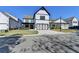 Charming two-story home featuring a large front yard, black trim, and well-manicured lawn at 3364 Old Concord Se Rd, Smyrna, GA 30082