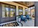 Charming front porch with seating area, double doors, and classic design elements at 3364 Old Concord Se Rd, Smyrna, GA 30082