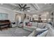Open-concept living room with stylish decor, wood floors, and abundant natural light at 3364 Old Concord Se Rd, Smyrna, GA 30082