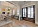 Well-lit office featuring stylish furniture, hardwood floors, and large windows at 3364 Old Concord Se Rd, Smyrna, GA 30082
