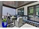 Cozy covered patio with comfortable seating, lighting, and stylish decor perfect for outdoor living at 3364 Old Concord Se Rd, Smyrna, GA 30082