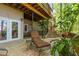 Relaxing outdoor deck with lounge chair and lush greenery, perfect for enjoying nature at 403 S River Farm Dr, Alpharetta, GA 30022