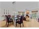 Open concept dining area with natural light flowing in from the windows at 403 S River Farm Dr, Alpharetta, GA 30022