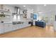 Well-appointed kitchen with stainless steel appliances, white and navy cabinets, and modern design at 403 S River Farm Dr, Alpharetta, GA 30022