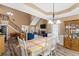 Open floorplan and dining area with modern furnishings and an airy atmosphere, perfect for entertaining at 704 Williamsburg Ct, Villa Rica, GA 30180