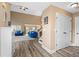 Inviting living room featuring hardwood floors, high ceilings, and modern decor at 704 Williamsburg Ct, Villa Rica, GA 30180