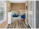Inviting living room featuring hardwood floors, high ceilings, and modern decor at 704 Williamsburg Ct, Villa Rica, GA 30180