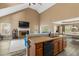 Open concept living and kitchen area with an amazing fireplace feature at 704 Williamsburg Ct, Villa Rica, GA 30180