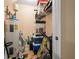 A utility closet cluttered with an Everkleen water heater, boxes and painting supplies at 704 Williamsburg Ct, Villa Rica, GA 30180