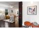 Inviting living room showcasing hardwood floors, modern decor, and seamless connection to the dining area at 830 Belgrade Ne Ave, Atlanta, GA 30306
