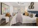 Spacious main bedroom showcasing a plush bed, decorative pillows, and stylish decor at 1344 Riverstone Rd # 108, Jonesboro, GA 30238