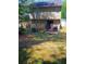 A spacious backyard includes a patio area, perfect for outdoor relaxation and gatherings at 2044 Mallard Crest, Lithonia, GA 30058