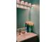Bright bathroom features a modern vanity and a large mirror for a clean and inviting space at 2044 Mallard Crest, Lithonia, GA 30058