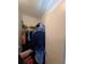 A walk-in closet with ample shelving and clothing storage at 2044 Mallard Crest, Lithonia, GA 30058