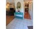 Inviting entryway with stylish console table and tile flooring at 2044 Mallard Crest, Lithonia, GA 30058