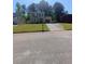Charming two-story home with manicured lawn and attached garage at 2044 Mallard Crest, Lithonia, GA 30058