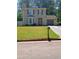 Charming two-story home with manicured lawn and attached garage at 2044 Mallard Crest, Lithonia, GA 30058