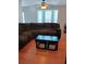 Living room featuring wood floors and a ceiling fan and large sectional sofa at 2044 Mallard Crest, Lithonia, GA 30058