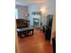 Cozy living room featuring hardwood floors, fireplace and a media center at 2044 Mallard Crest, Lithonia, GA 30058