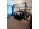 The main bedroom features a bed frame with a large padded headboard and ceiling fan at 2044 Mallard Crest, Lithonia, GA 30058