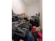 A walk-in closet with wire shelving and a collection of items in a spare room at 2044 Mallard Crest, Lithonia, GA 30058
