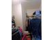 Picture of a walk-in closet with metal shelving and lots of items at 2044 Mallard Crest, Lithonia, GA 30058