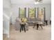 Spacious living room with a comfortable sectional sofa, natural light, and neutral decor at 395 Anvil Way, Austell, GA 30168