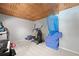 Finished basement with exercise equipment and textured ceiling at 4016 Upland Trce, Marietta, GA 30066