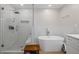 Modern bathroom featuring a glass enclosed shower and a free-standing tub at 4016 Upland Trce, Marietta, GA 30066