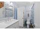 Charming bathroom with anchor-themed shower curtain and decor, light blue walls, and white fixtures at 4016 Upland Trce, Marietta, GA 30066